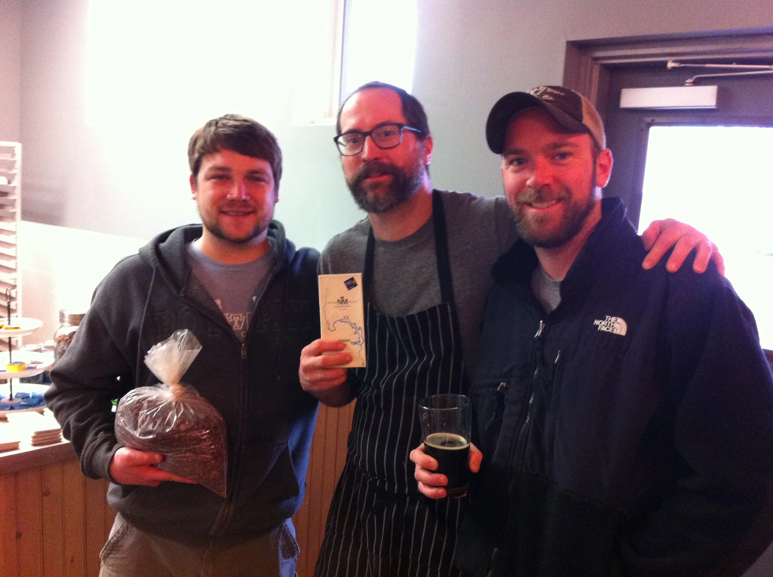 Roy with cocoa nibs, Nate with the chocolate, Chris with the beer