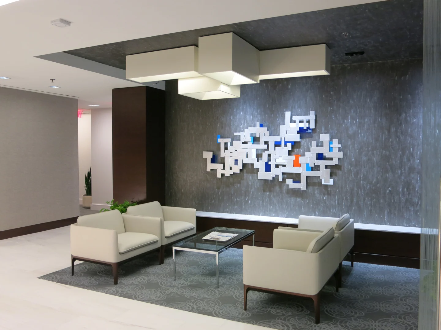 Aluminum and Plexiglas wall sculpture