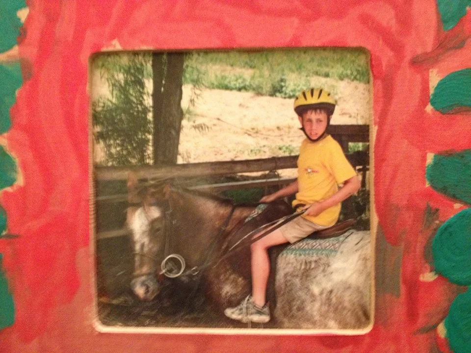 Embarrassing childhood photo: 9 year old Andrew displays his passion for horseback riding.