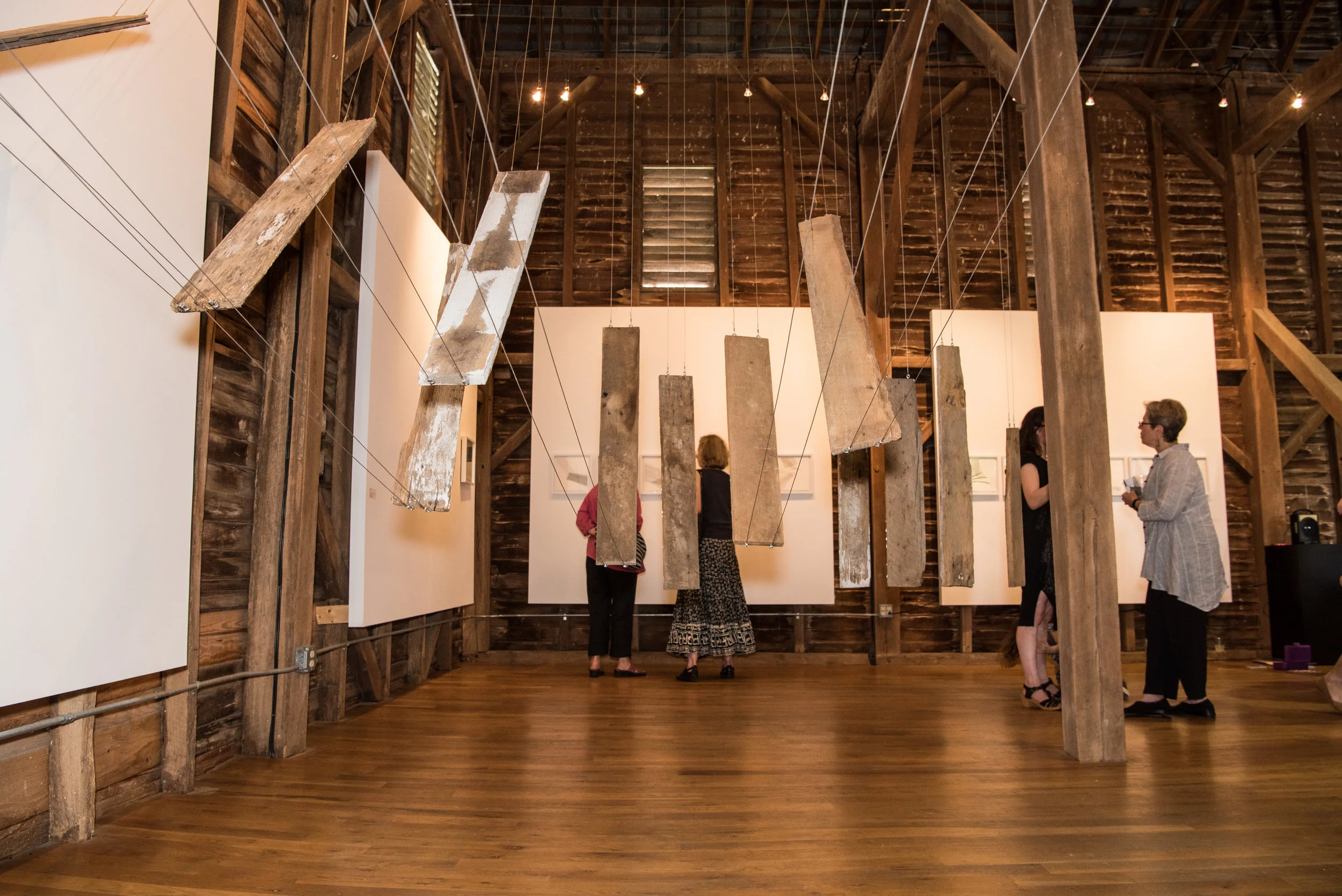 Sarah Hardesty's work interacts with the barn's finishes.