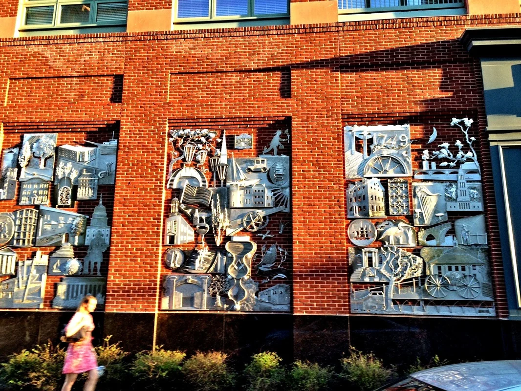 This install involved mounting over 60 individual aluminum sculptures to a three 8'x12' brick niches in Alexandria. 