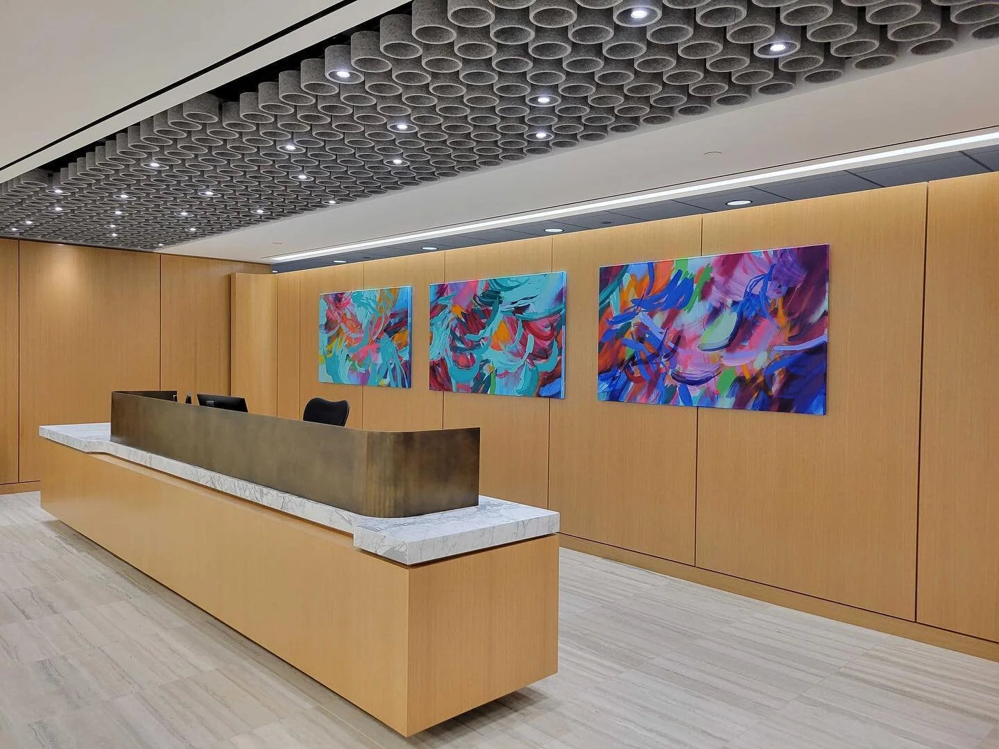 The Bass Berry Sims @bassberrysims law firm moved into a brand new space with sleek geometric accents but a lot of blank walls. When discussing what the client wanted, BBS had one request; COLOR! Artist Circle delivered on that ten fold with with fou