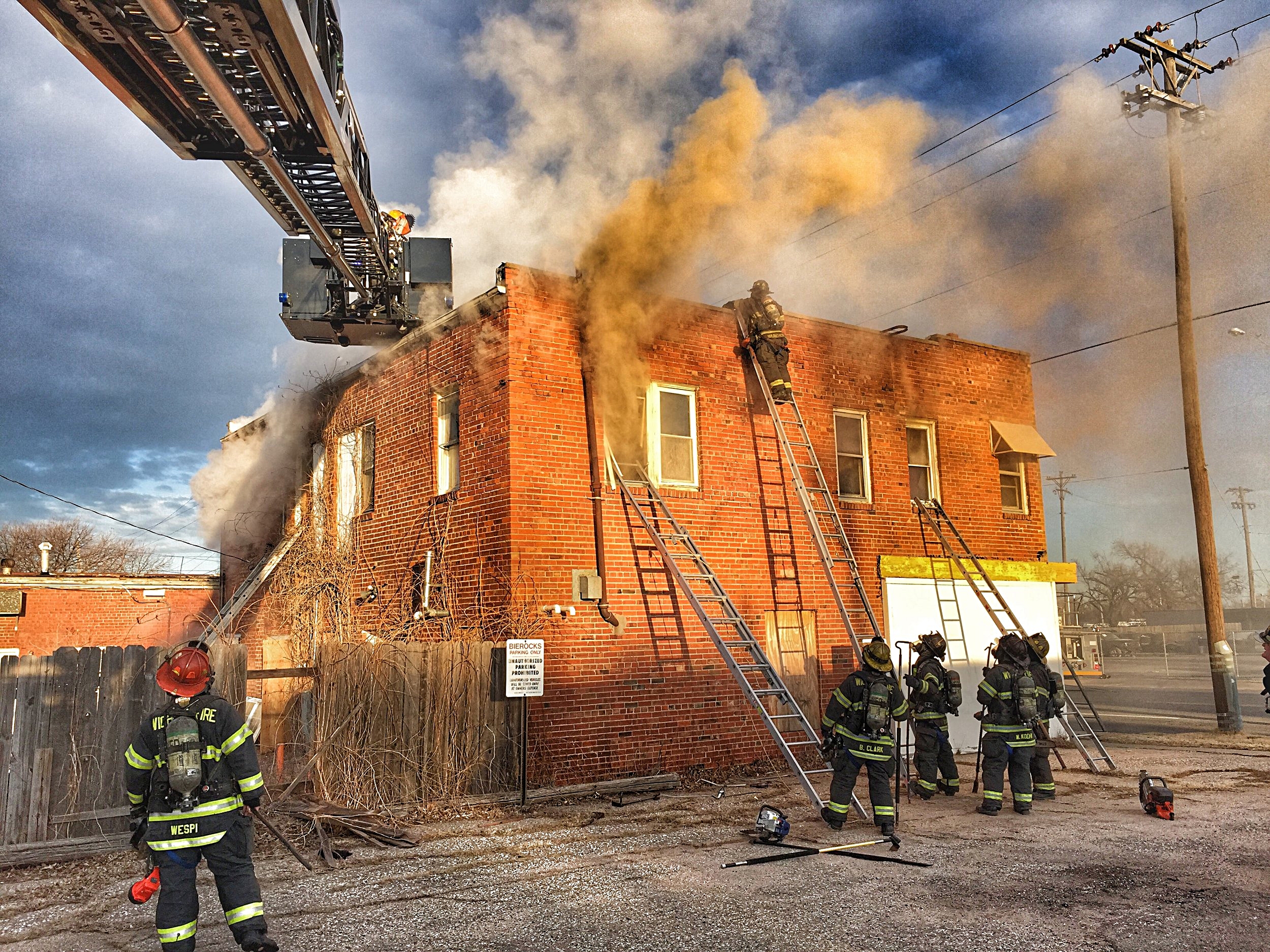 Wichita firefighters operating at a vacant two story apartment house in Midtown