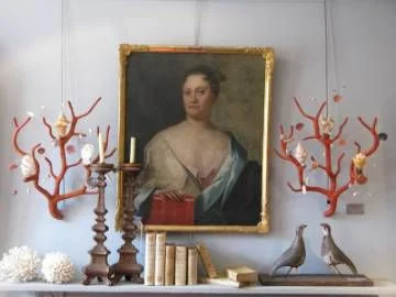 Faux Red Coral Sconces (source unknown!) That vibrant red color is so striking it is not uncommon to find imitation coral designs.