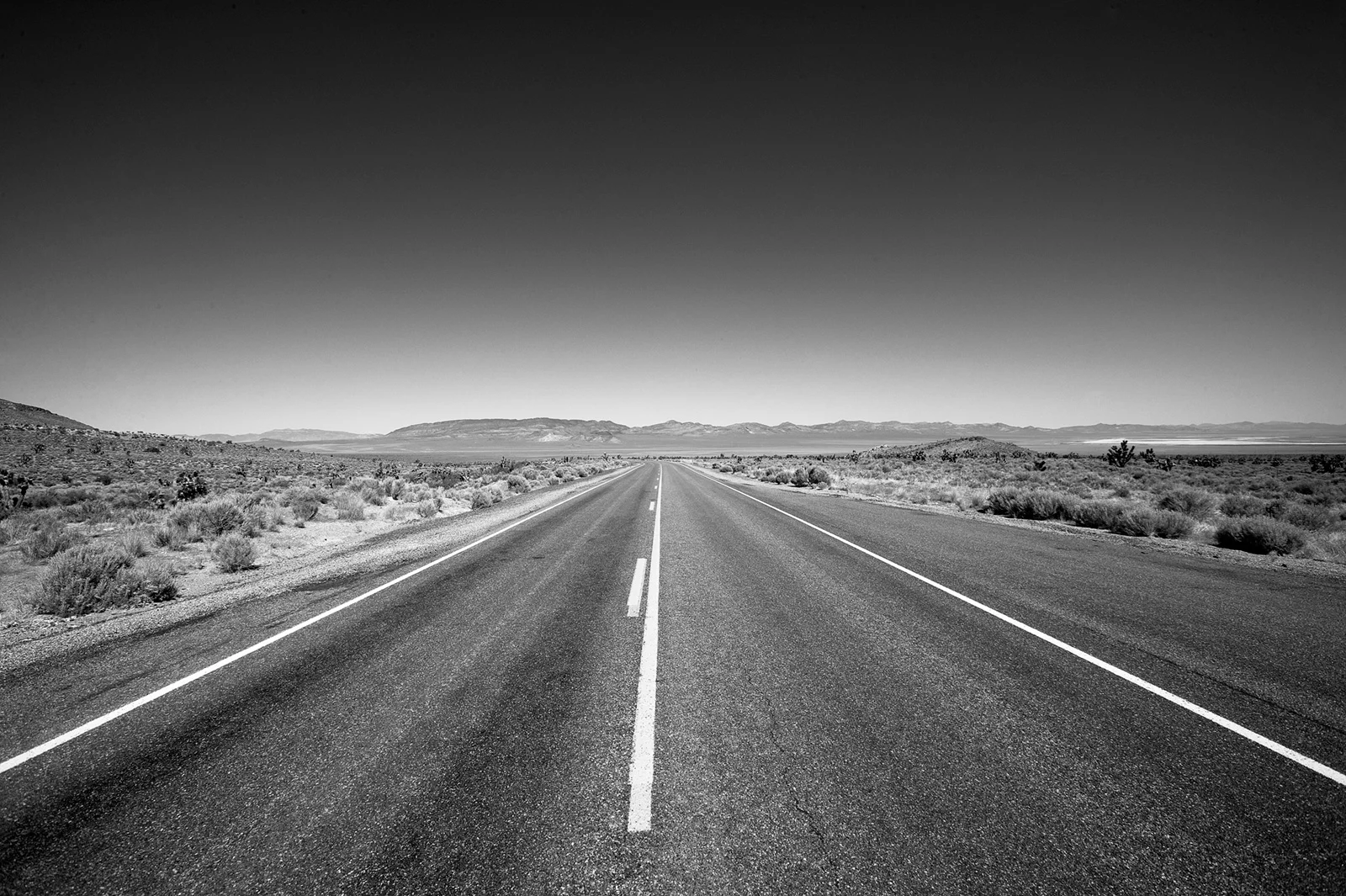 Define the shoulders of the road ahead.