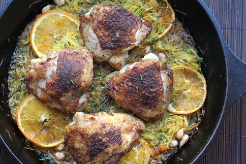 North African-Spiced Chicken Thighs with Oranges, Marcona Almonds, & Summer Vegetables