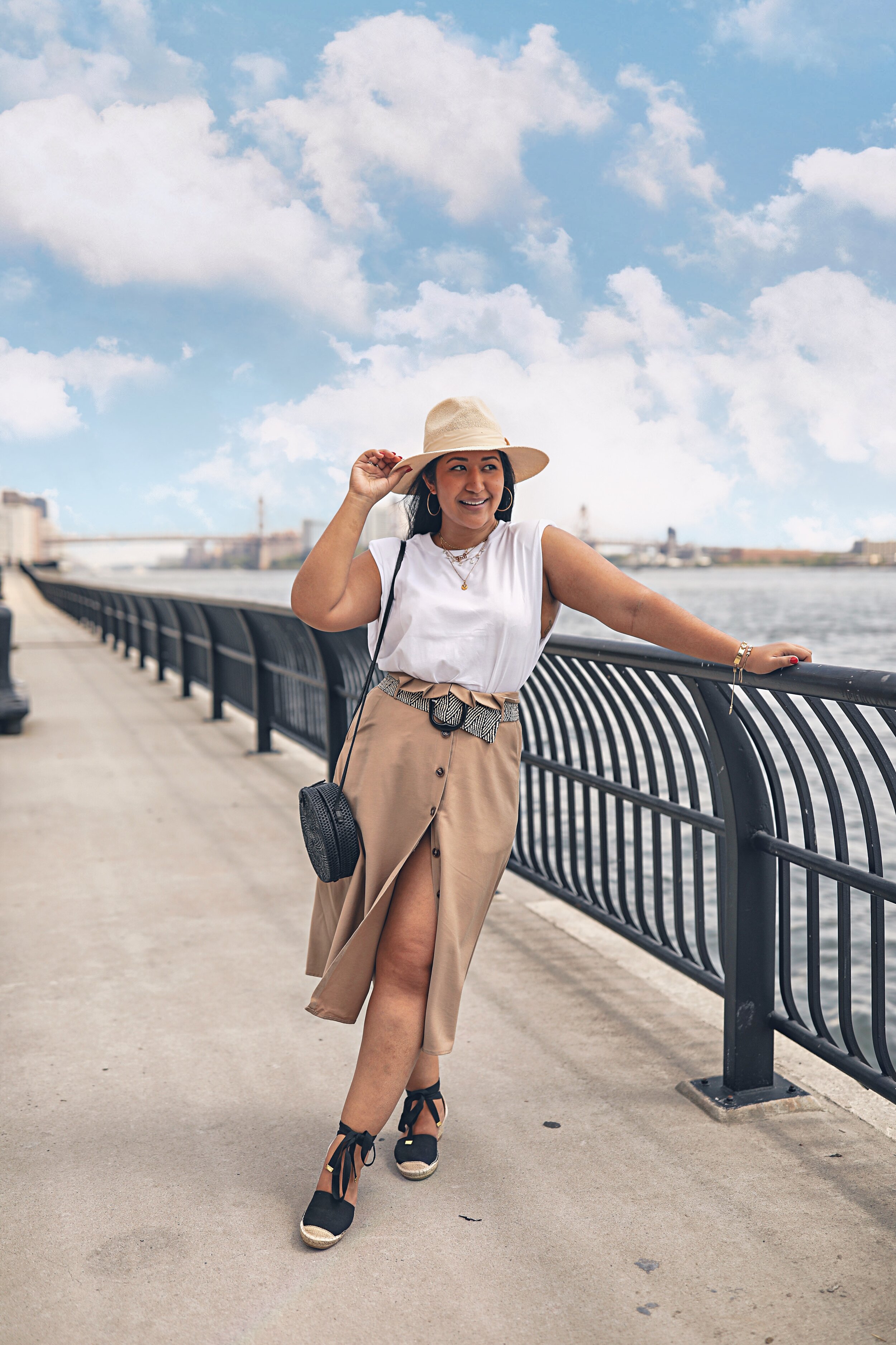 Casual summer outfit- white shoulder pad muscle t-shirt and beige skirt