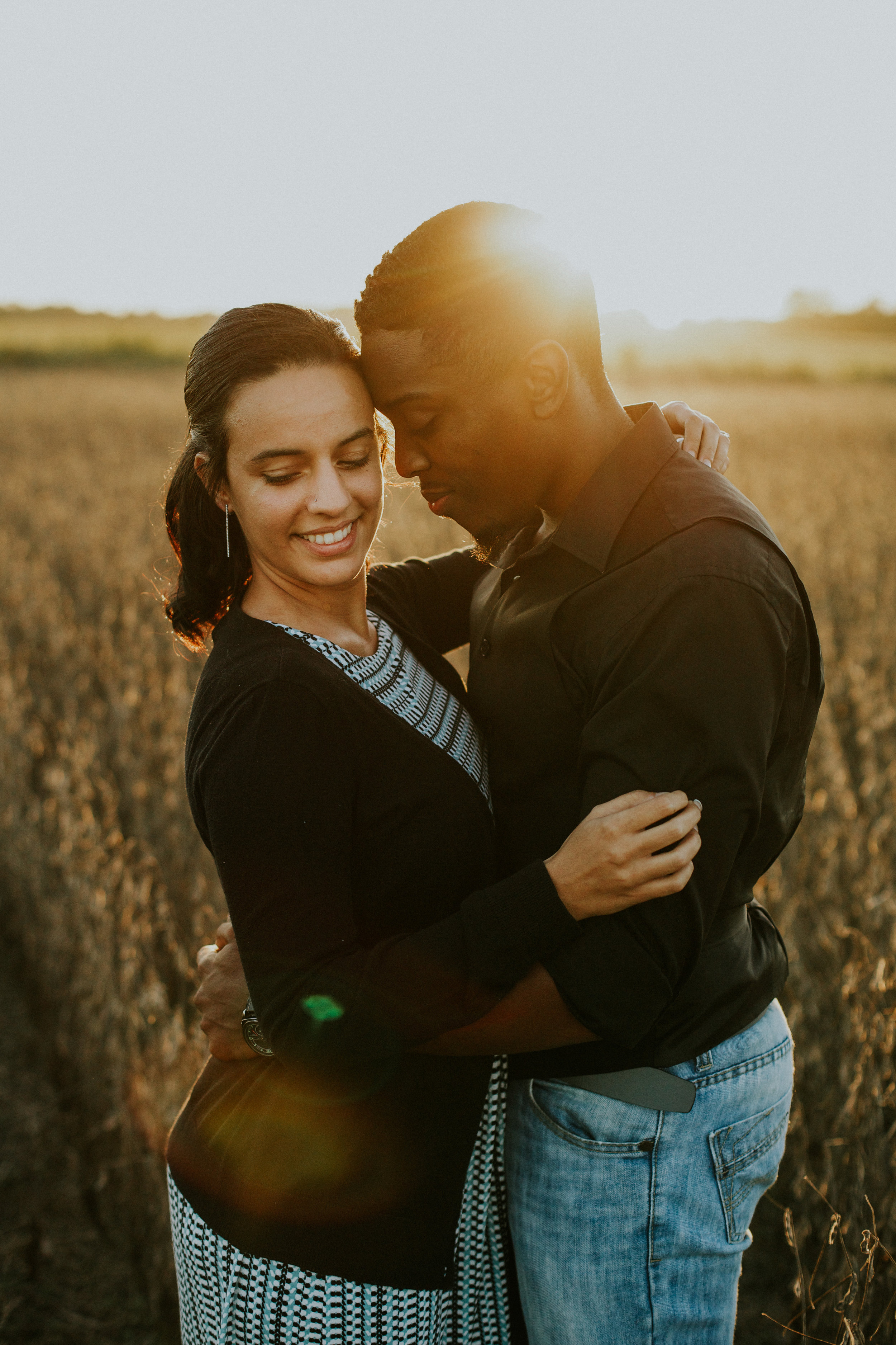 Delaware-Photographer walking during golden hour in a field