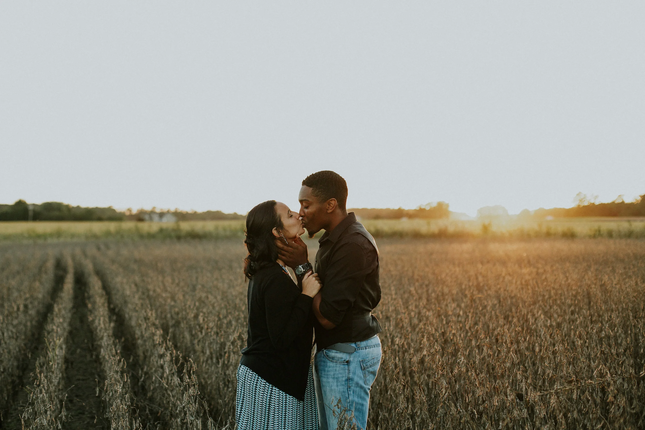 Delaware-Photographer walking during golden hour in a field