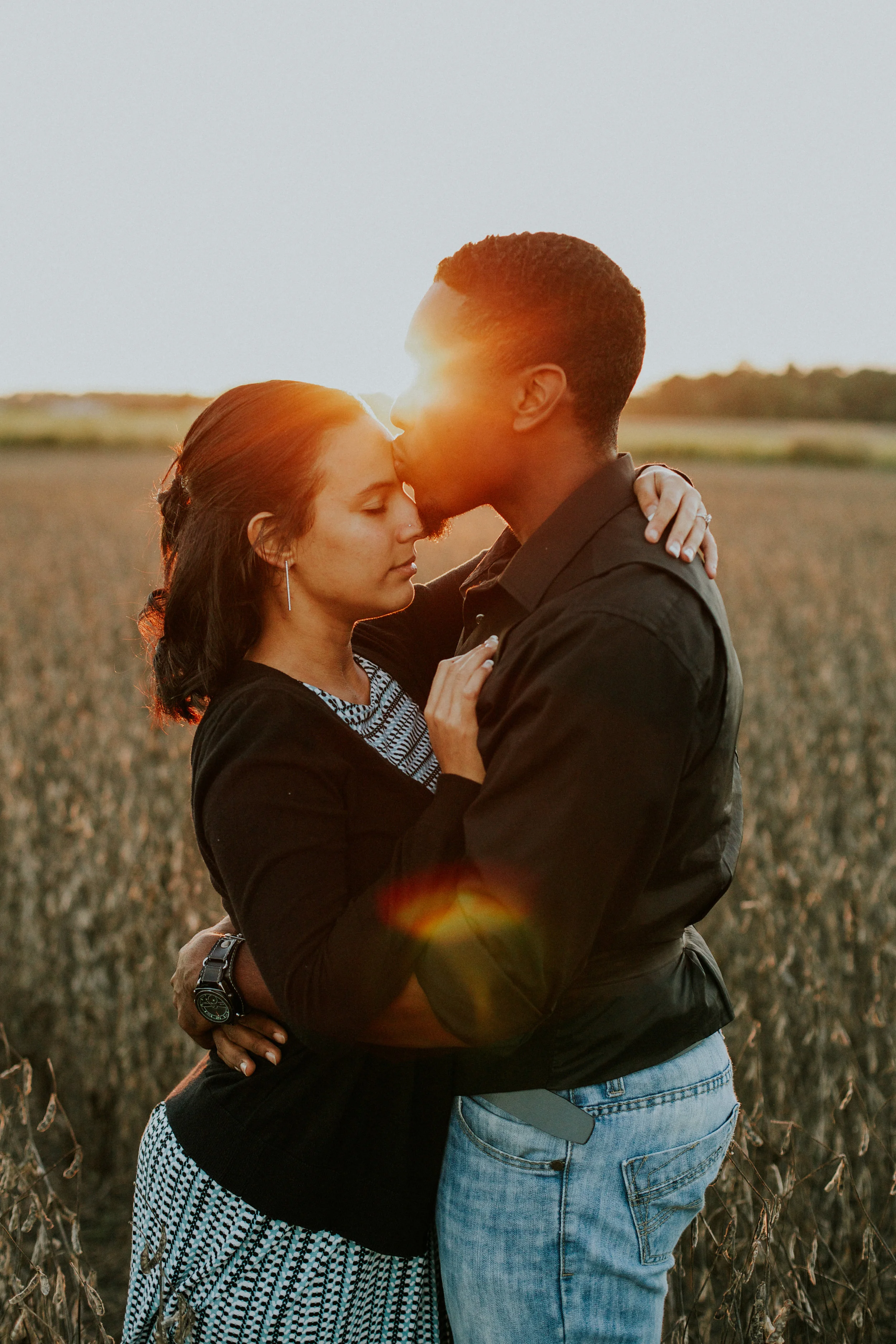 Delaware-Photographer walking during golden hour in a field