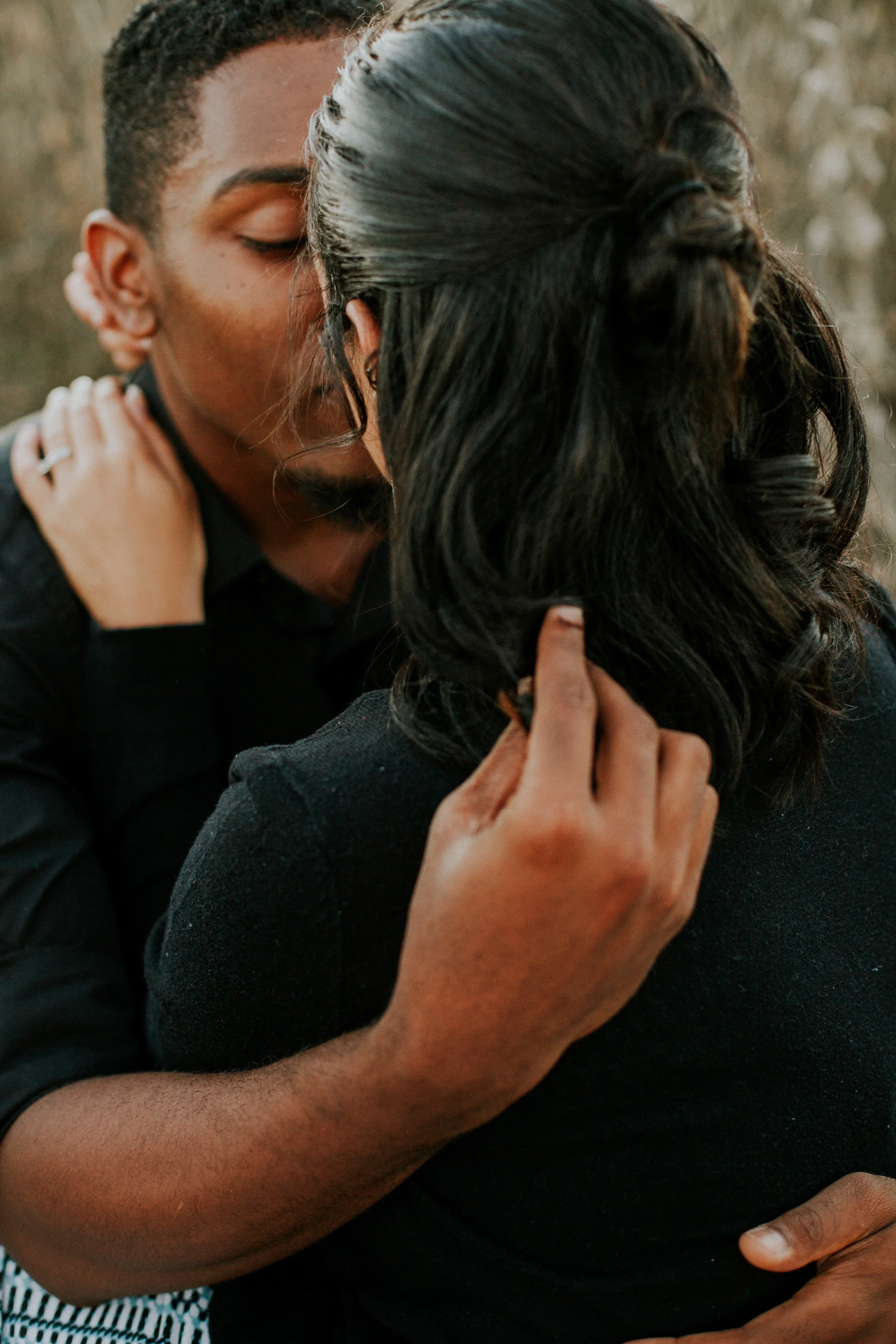Delaware-Photographer walking during golden hour in a field
