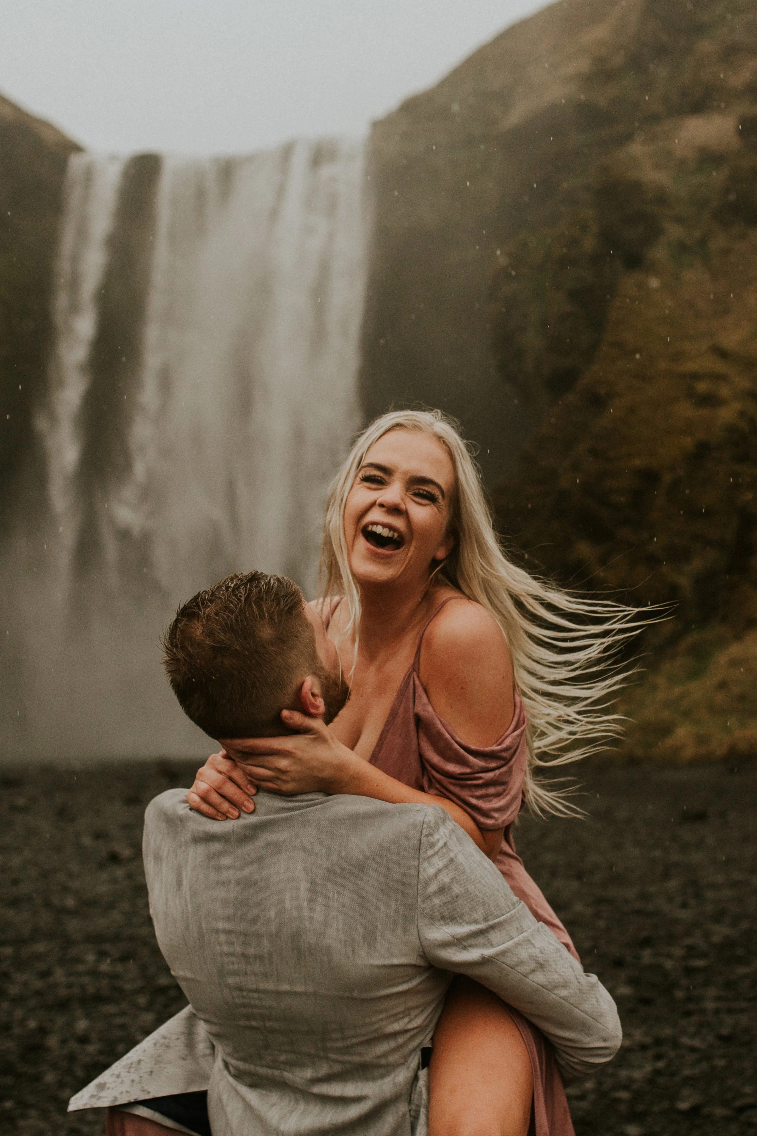 icelandic couple Rebecca and Steinar at skogafoss by BreeANna LAsher