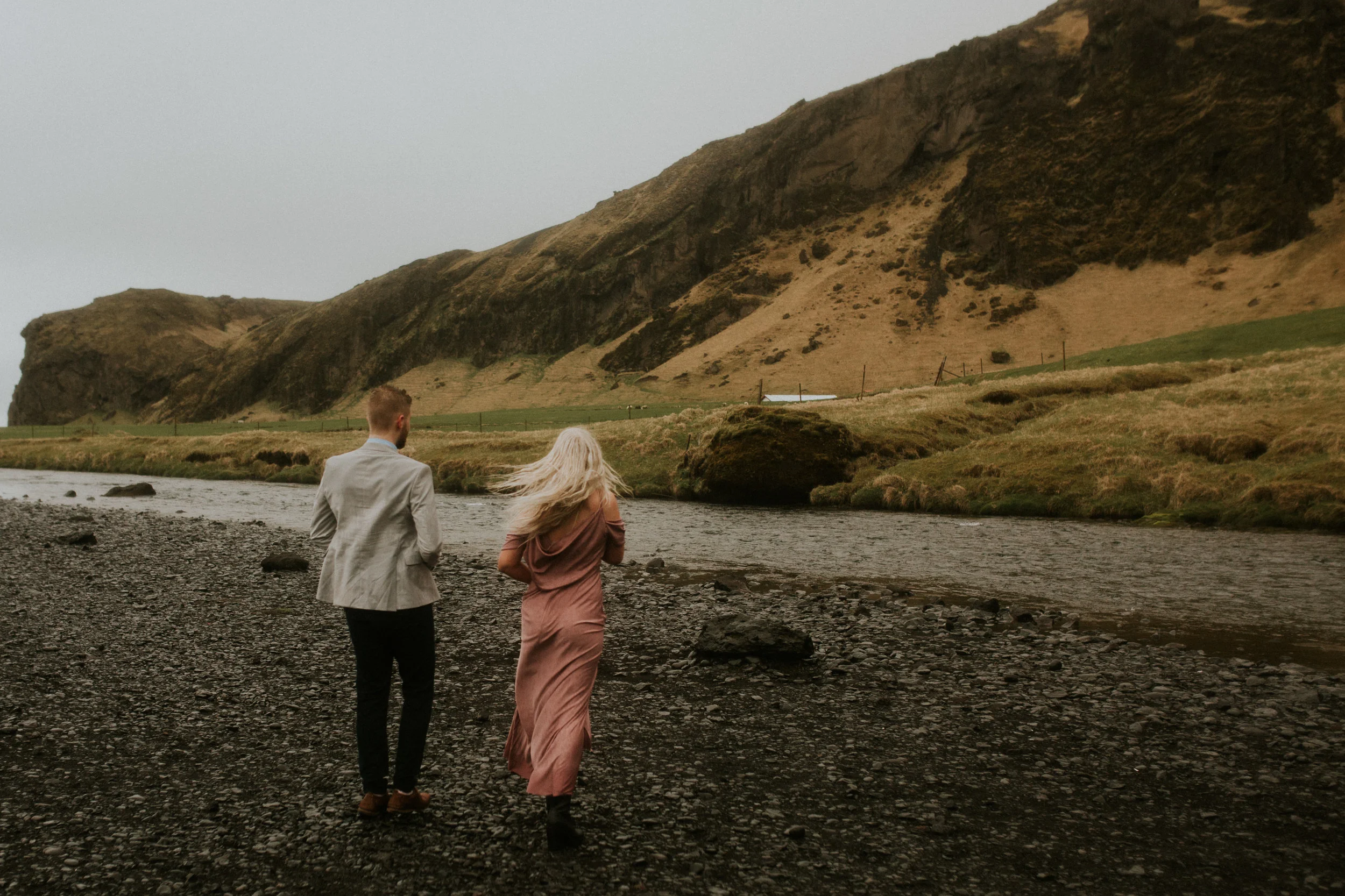 skogafoss couple in iceland engagementphotography breeanna lasher