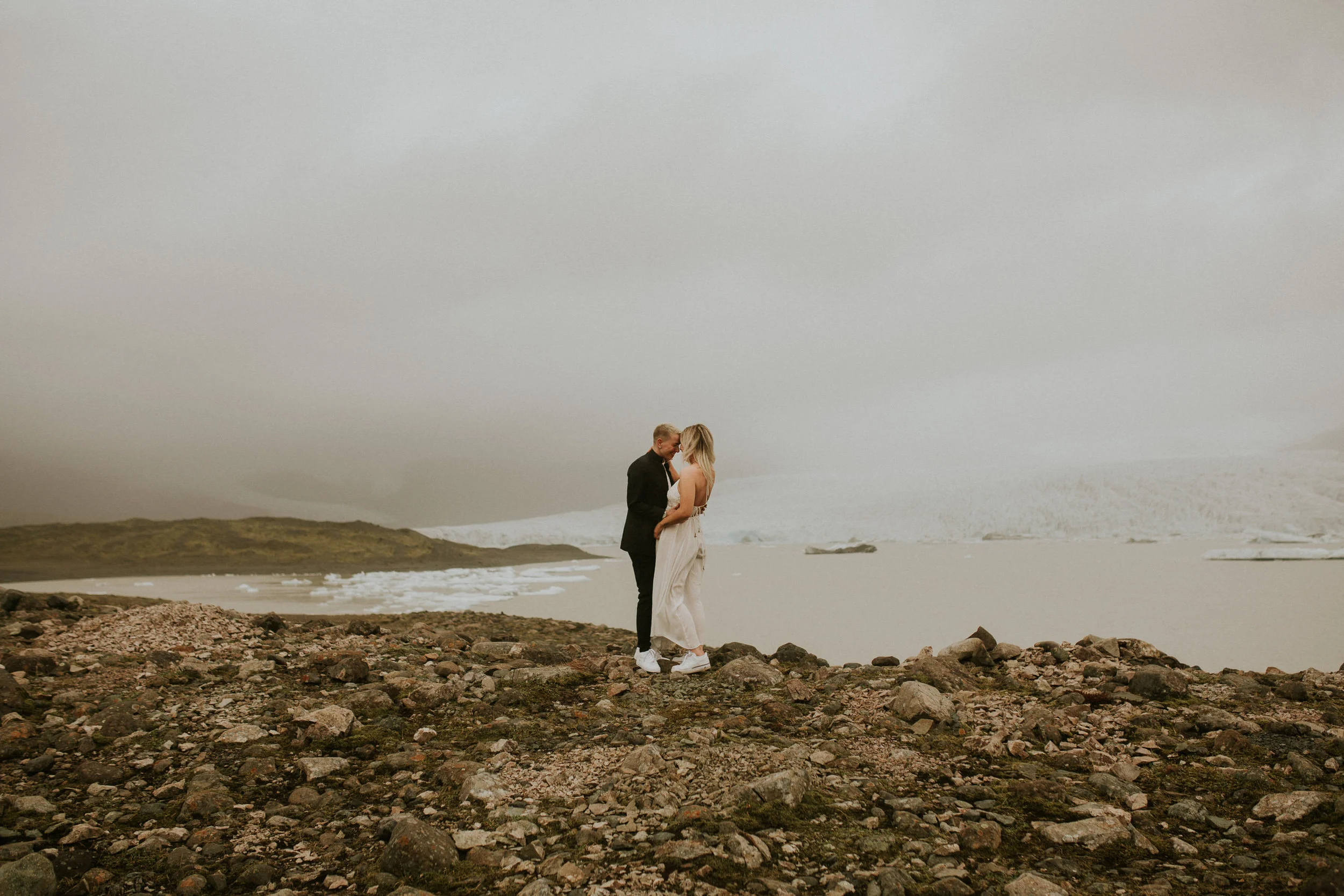 same sex elopement iceland first look photographer iceberg lagoon