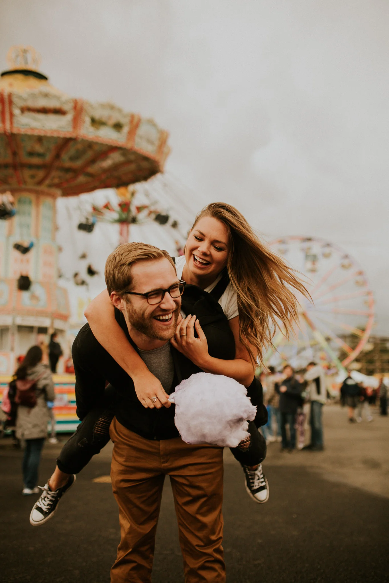 Summer vibe couple having fun at Puyallup fair engagement session for engagement photos.