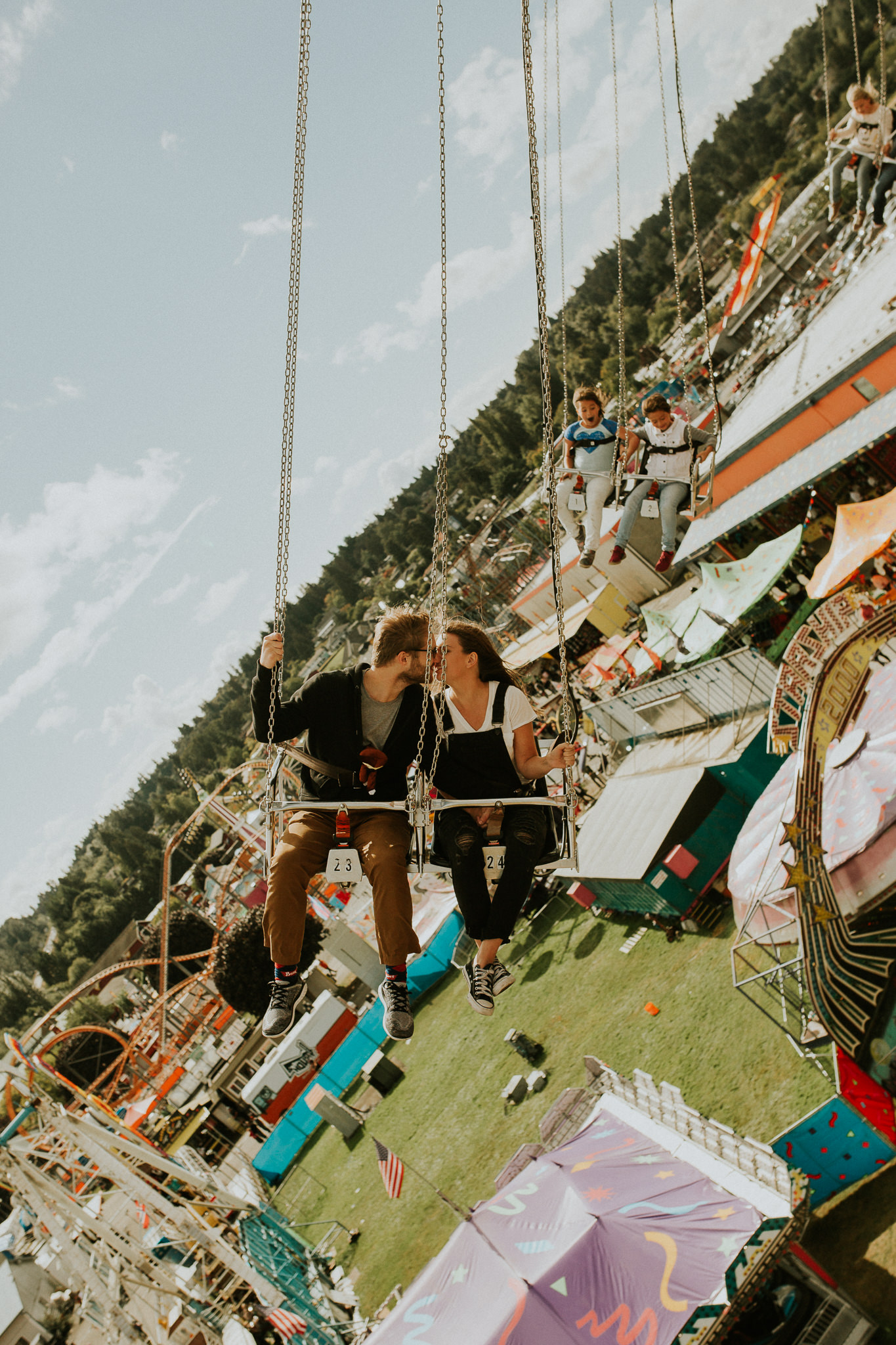 state fair engagement session with cute couple, Puyallup fair engagement session, Pnw elopement photographer, - pnw wedding photographer - pnw intimate wedding - Seattle elopement photographer - Seattle intimate wedding photographer - Seattle Kerry …