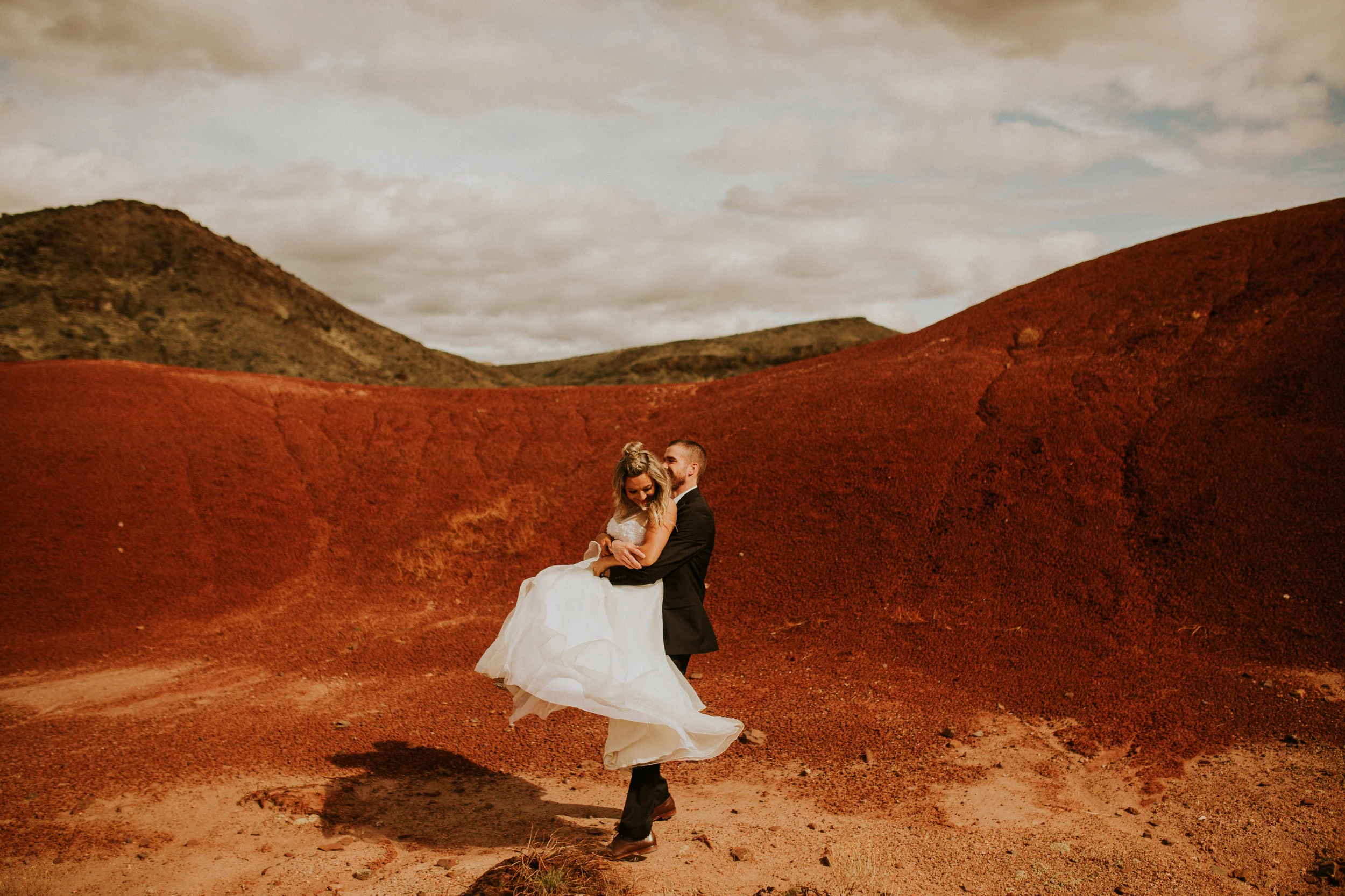 the painted hills in oregon elopement in the sun