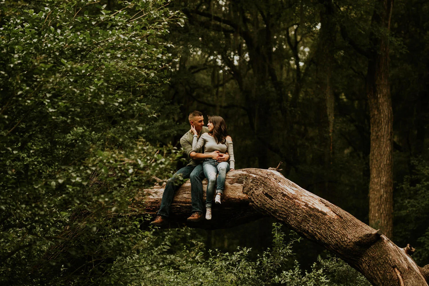 san antonio engagement photography cute couple up in a tree