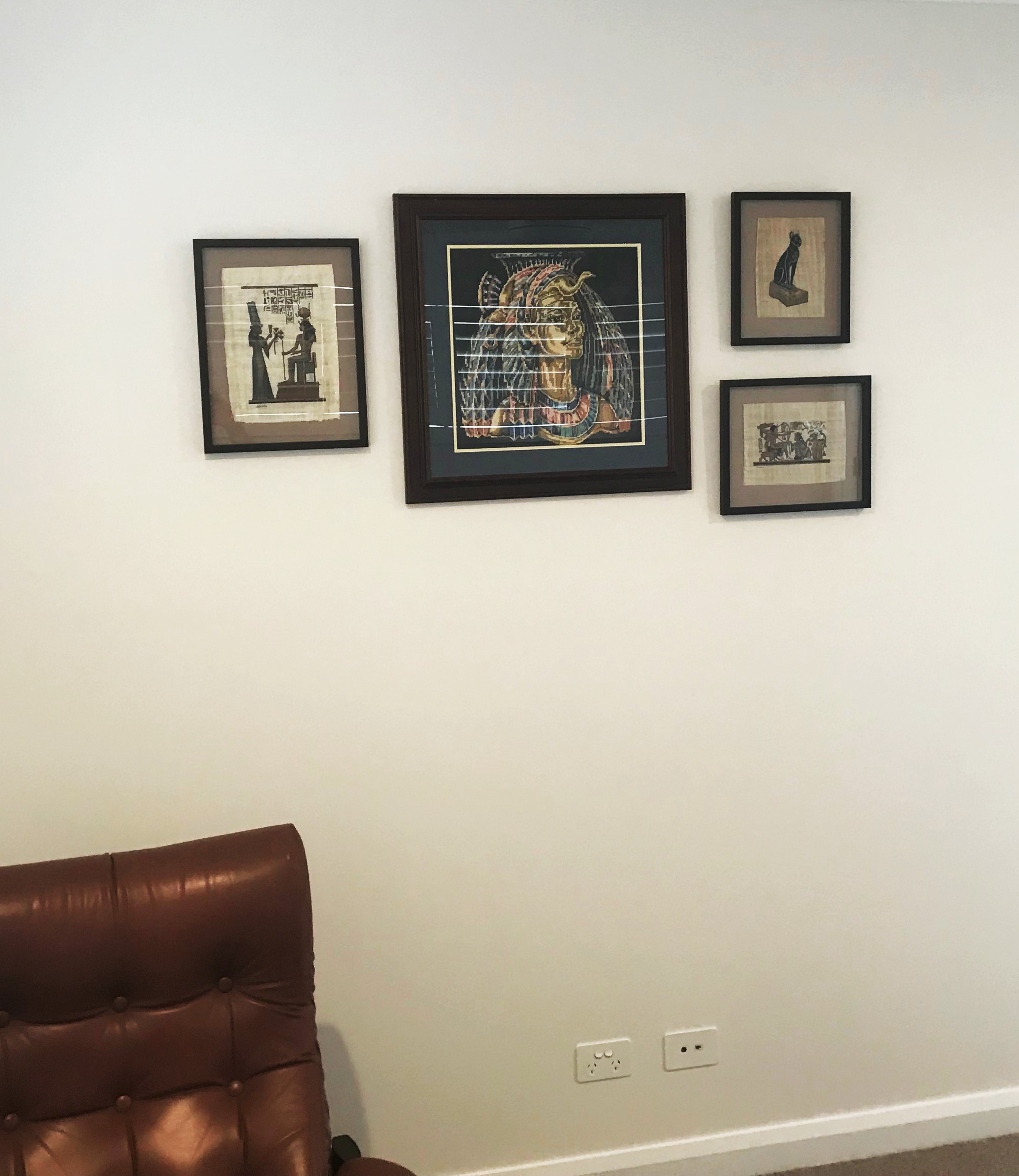 gallery hang egyptian art brisbane.jpg