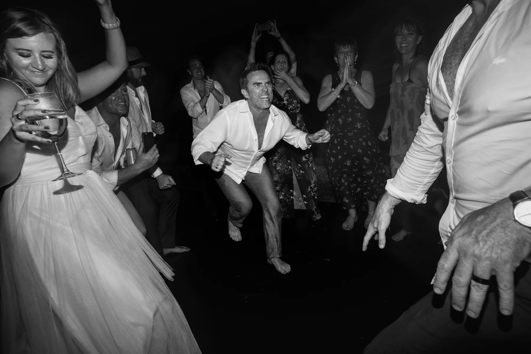 The South African best man had some distinctly different dance moves during the reception as photographed by documentary wedding photographer Erin Parker a Sayulita wedding photographer available to document your destination wedding in Mexico and worldwide.
