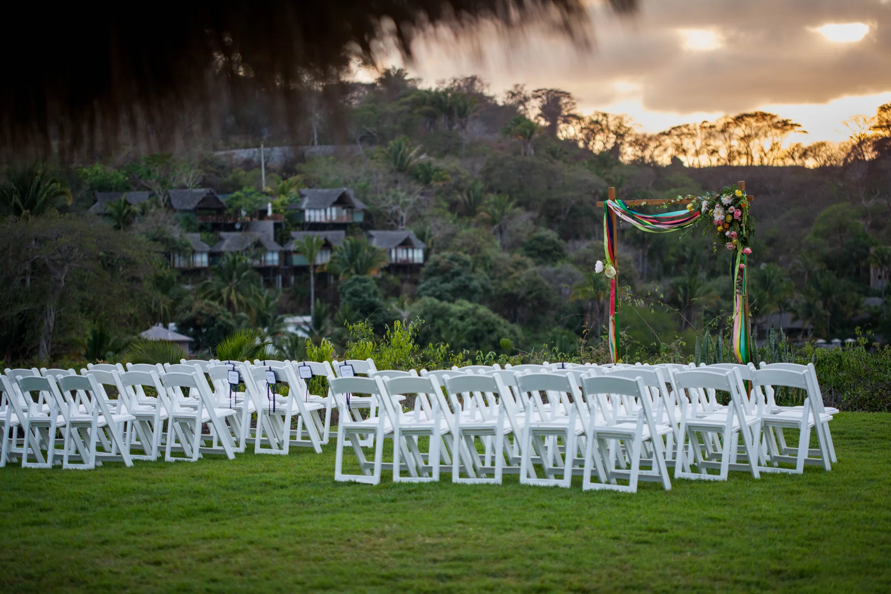 alternate view of ceremony on west lawn with guests facing west