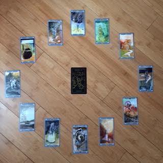 Astrological spread using The Fairy Light Tarot and Golden Thread Tarot