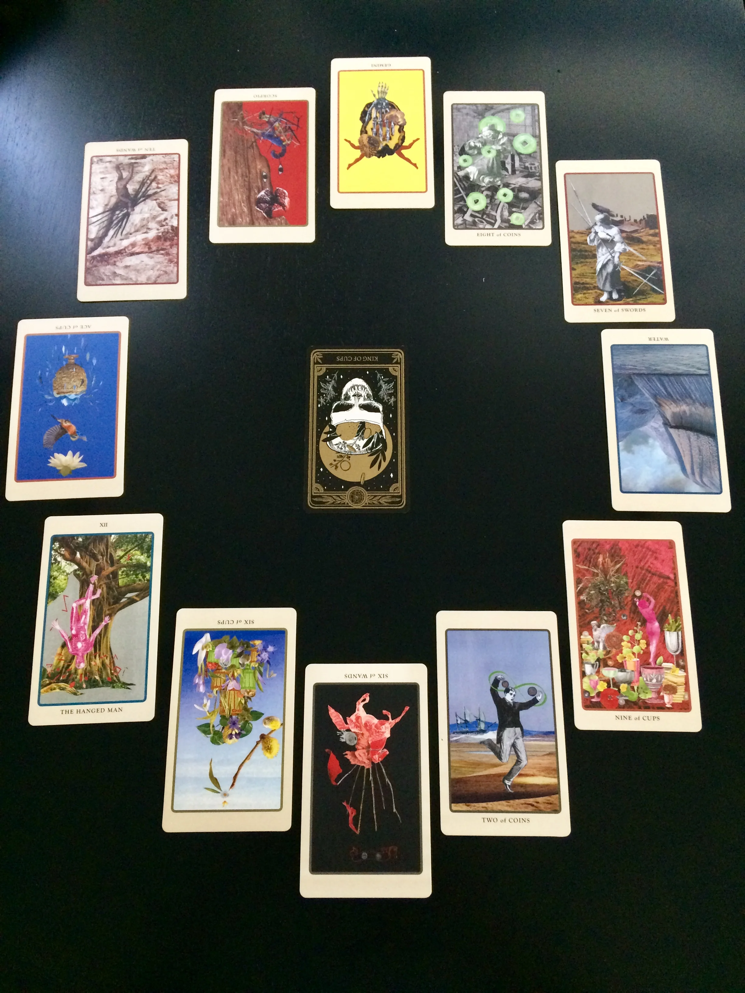 Astrological spread using cards from The Marigold Tarot and Spolia Tarot