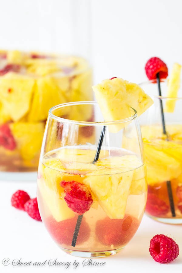 Sangria is a crowd pleaser and this light, colorful recipe will not let you down. Garnish with fruit on cocktail straws and watch it go. You can prepare this the day before your party (or make extra to enjoy after the party). Find the recipe at sweetandsavorybyshinee.com, here .