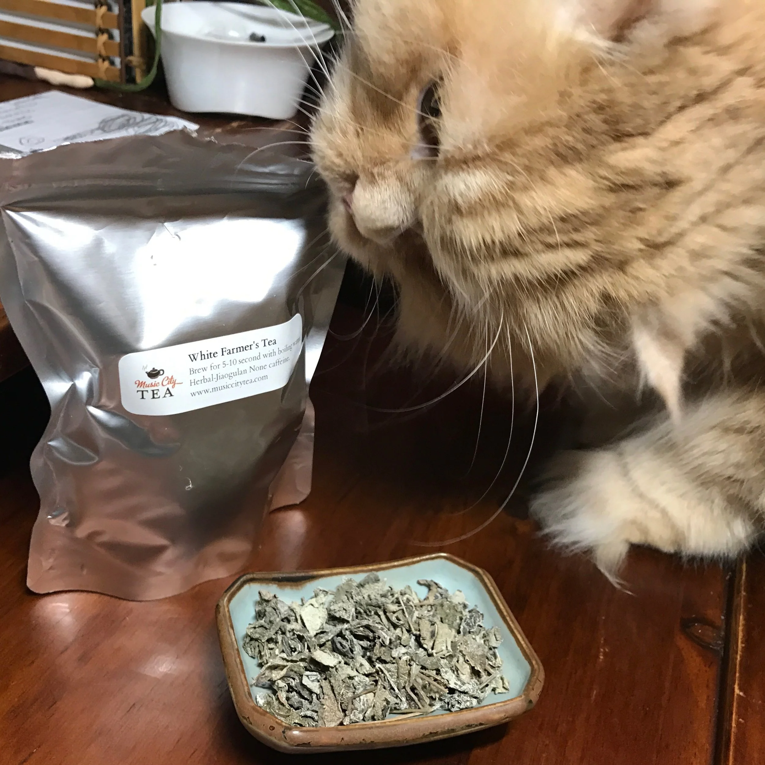 Looks like Simon , my Persian kitty, likes Farmer's Tea, too! NO CAFFEINE, steep in boiling water for 5-10 sec.