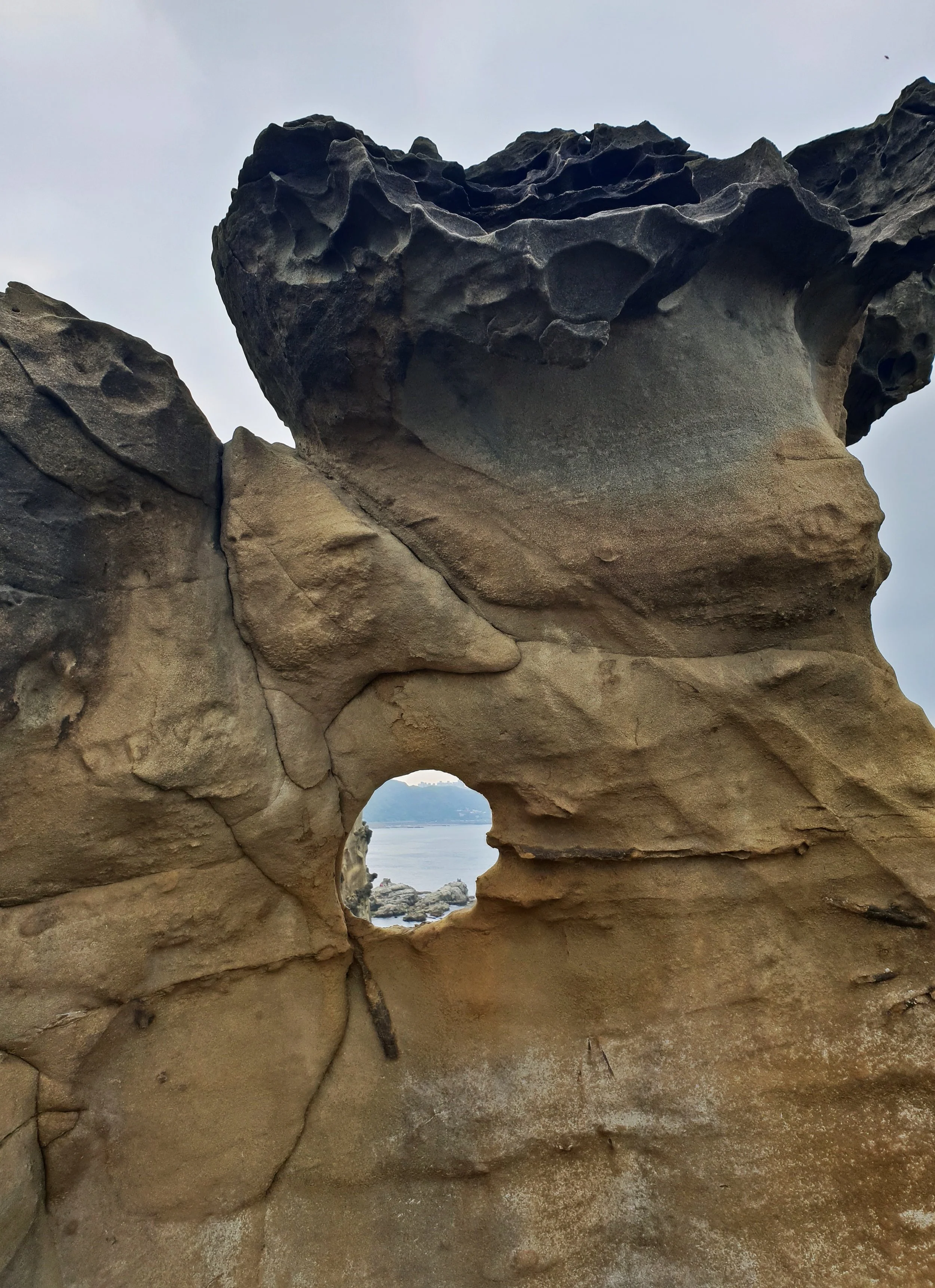 The rock is soft and easily eroded. An unusual rock porthole