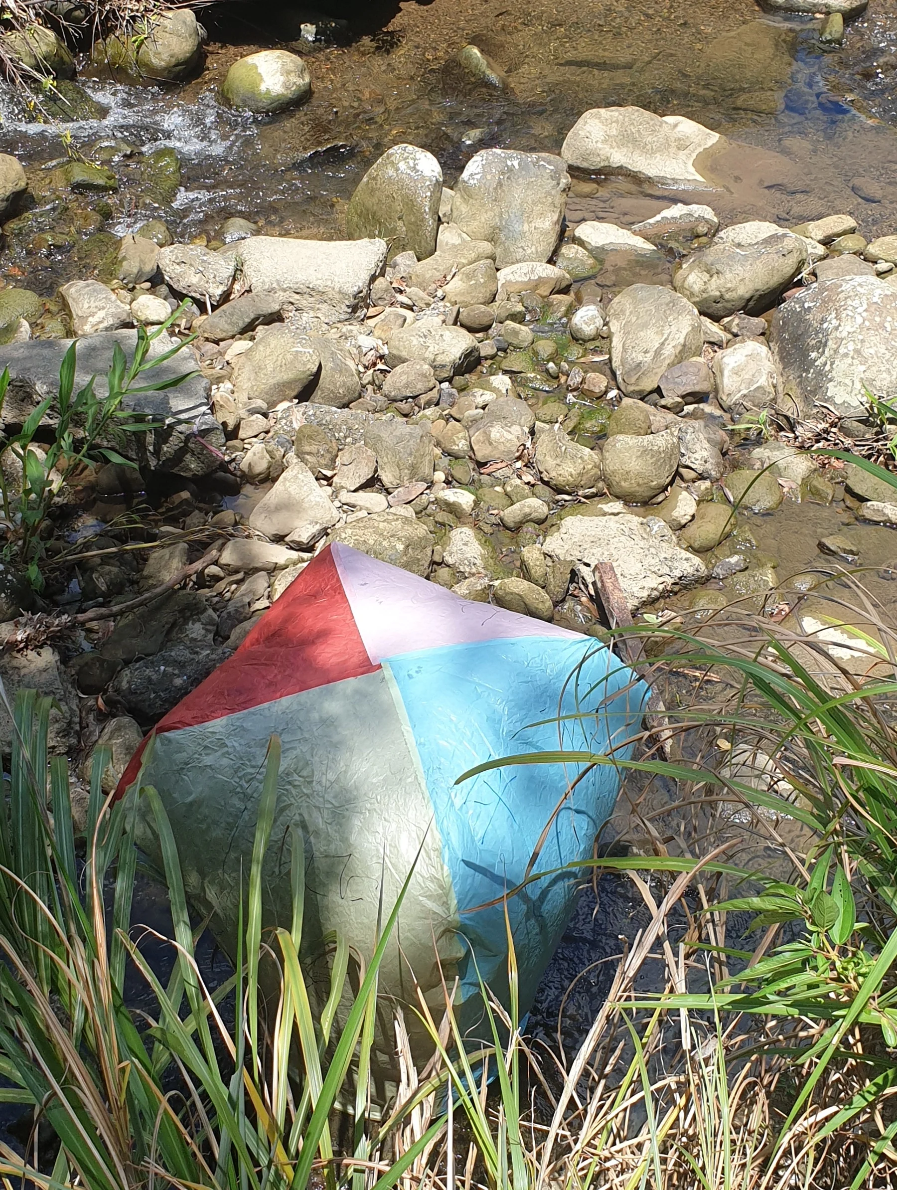 This lantern has ended up in a river!