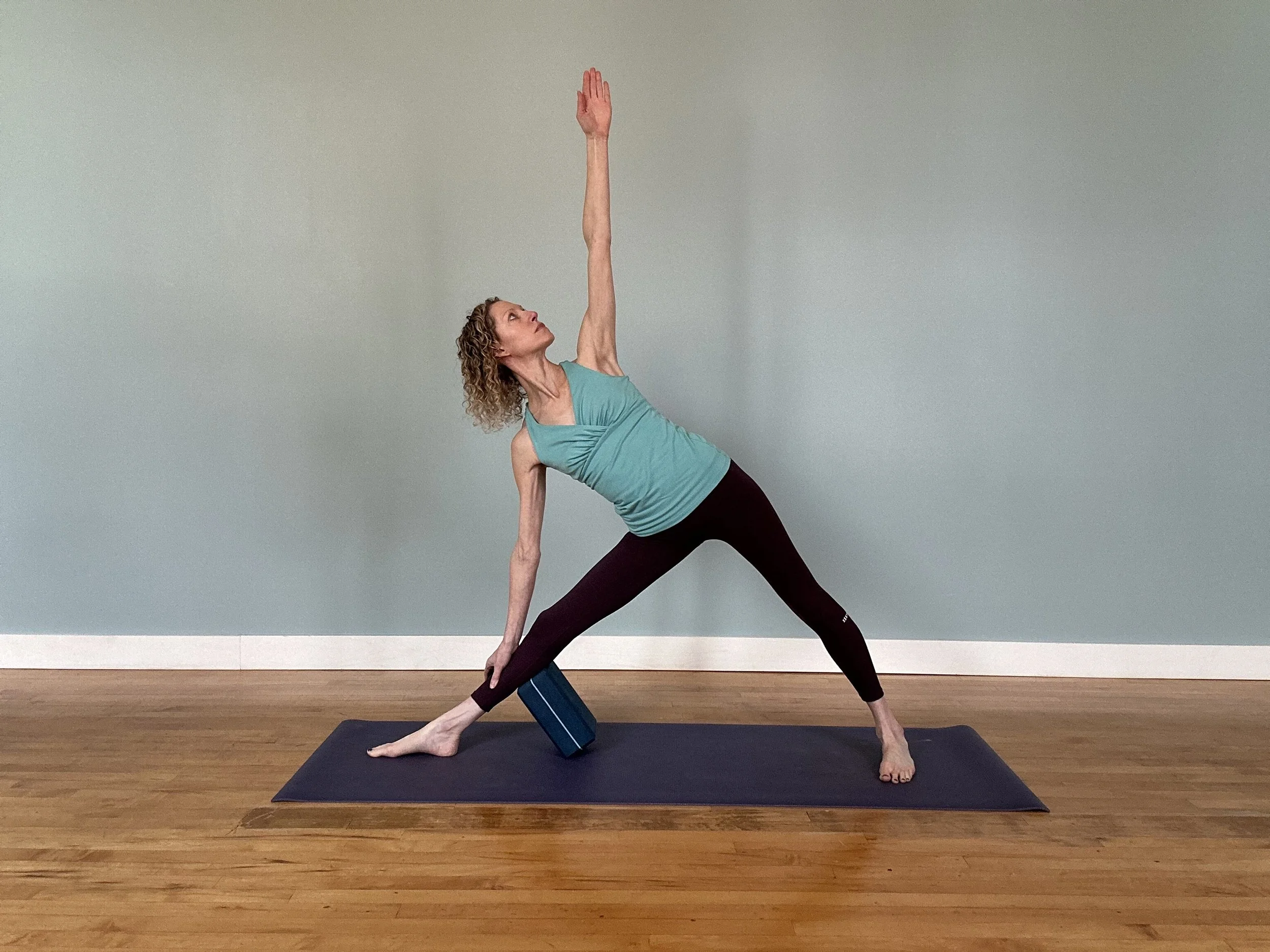 Is Knee Hyperextension Bad? 4 Triangle Pose Hacks for Hyperextended Knees