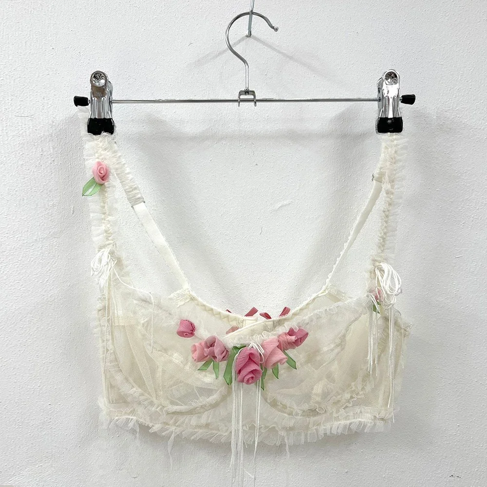 Sheer tulle balconette bra with silk chiffon rosebuds and fringe detail