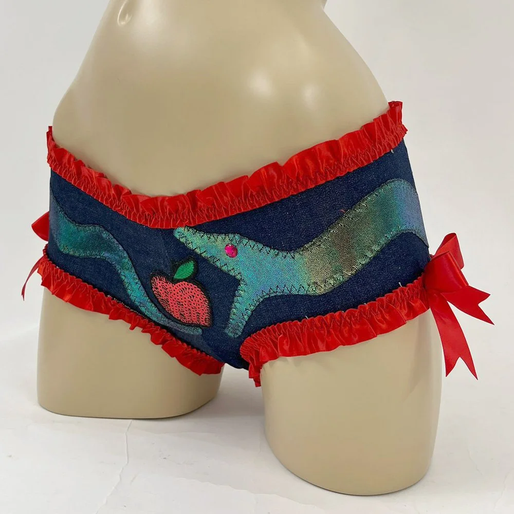 Serpent denim shorts