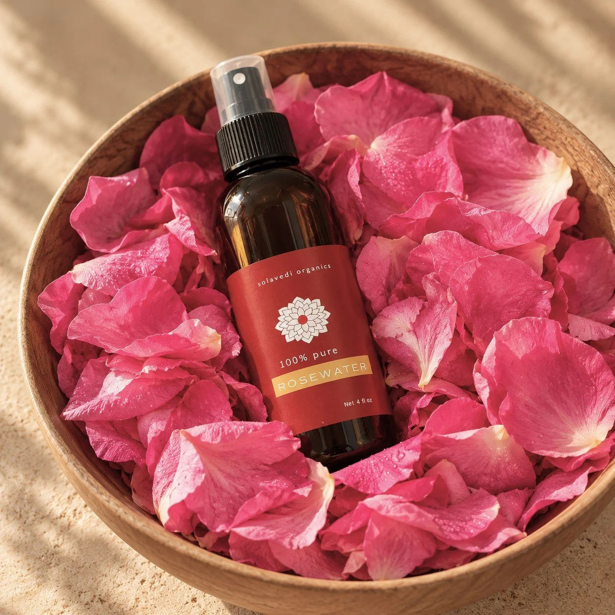 Rosewater Bottle in Rose Petals.jpg