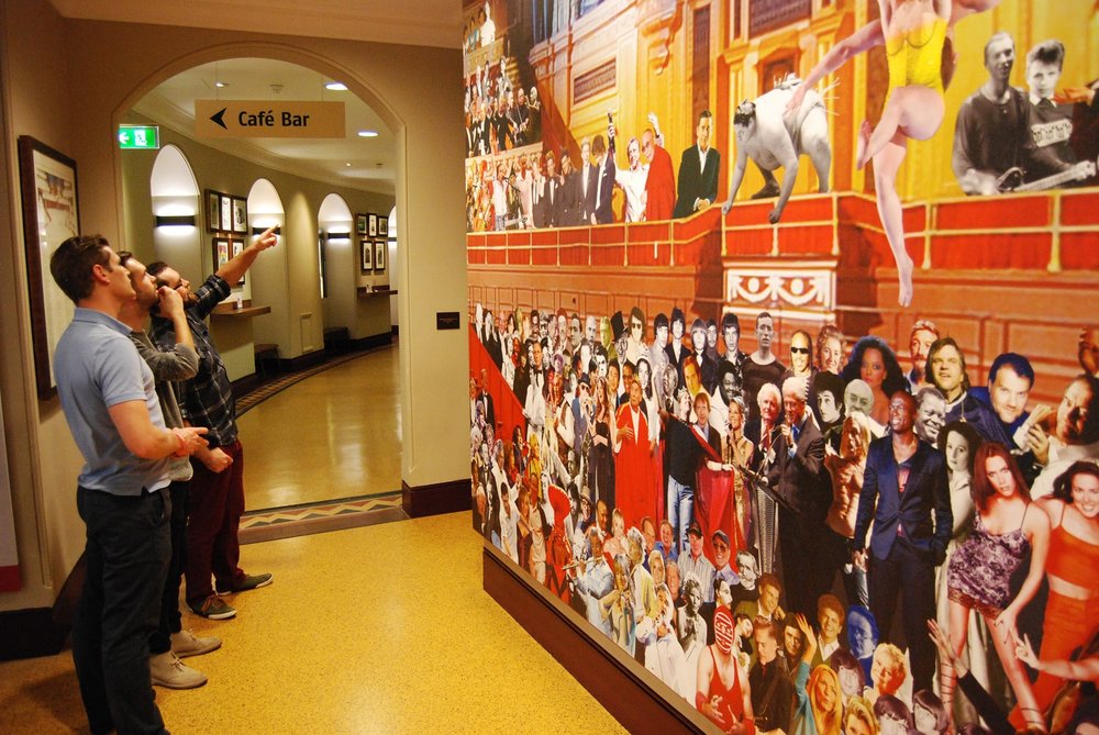 3B web team by mural of "Appearing at the Royal Albert Hall"