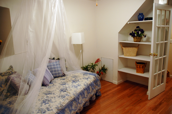 downstairs bedroom with bath en suite.jpg