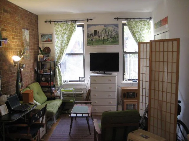 Large windows and bike storage behind screen.jpg