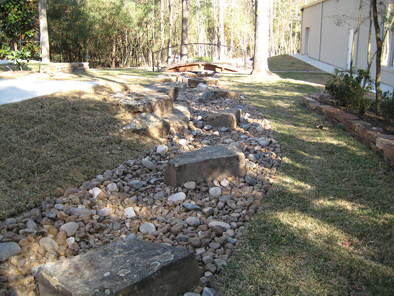 ac-dry-river-bed-drainage-orrogation-landscape-custom-landscaper-company-best-landscaping-ideas-the-woodlands-spring-houston-hill-country-bridge-conroe-montgomery-cypress-commercial-residentail-home.jpg