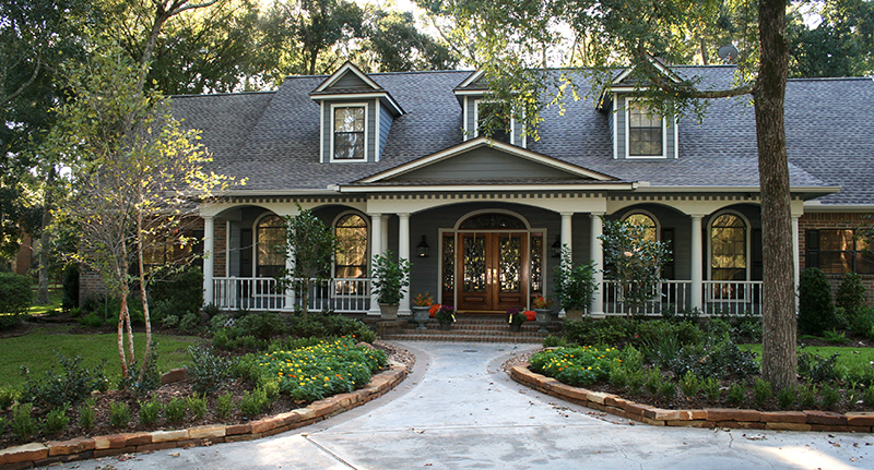 cottage-garden-with-river-birch,-camellia,-boxwood,-seasonal-color,-moss-rock-stacker-retaining-walls,-Magnolia-Texas.jpg