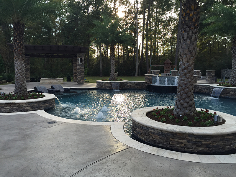 custom-pool-water-fire-bubblers-the-woodlands-houston-aggie-spring-conroe-hill-country-rustic-luxury-envy-cypress-montgomery-palm-travertine-concrete-best-gorgeous-pool-builder.jpg
