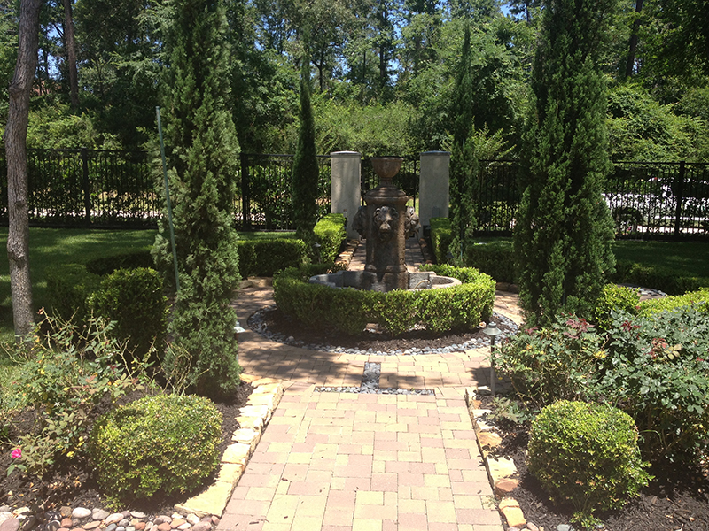 landscape-custom-design-houston-carlton-woods-the-woodlands-tx-cypress-magnolia-formal-luxury-landscaper-landscape-company-fountain-pavers-best-envy-exteriors-spring-wrought-iron-fence.jpg