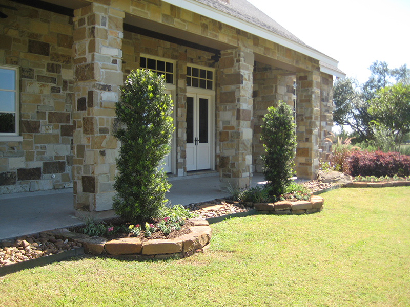landscape-design-intall-stone-border-the-woodlands-tx-tomabll-spring-cypress.jpg