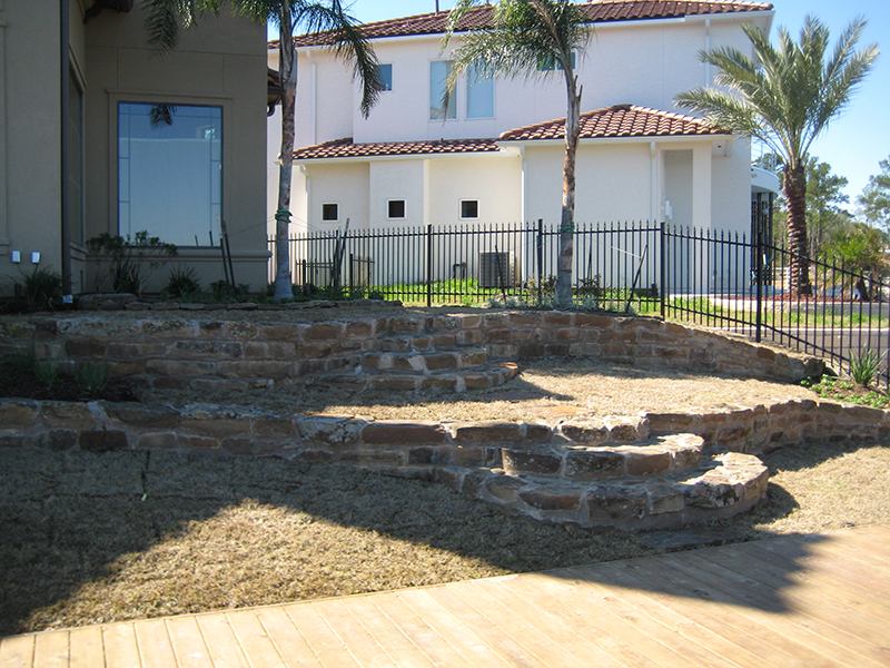 Retention-wall-stone-wall-on-lake-conroe-landscape-landscape-the-woodlands-spring-cypress.jpg