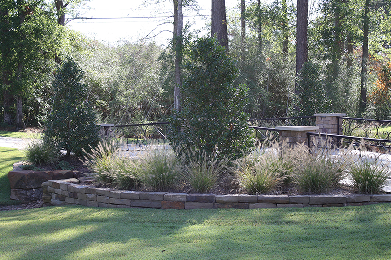 the-woodlands,-tyx-woodlands-spring-conroe-cypress-montgomery-custom-landscape-design-install-landscaper-stone-culvert-bridge-driveway-moss-rock-holly-columns-riverbed-wooded-wrought-iron-commercial-landscaping.jpg