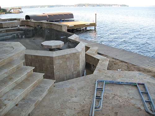 custom-pool-lake-conroe-conroe-on-lake-infinity-zero-edge-design-build-pool-builder-stone-table-in-pool-designer-architect-luxury-top-best-award-wining-the-woodlands-houston-spring-magnolia-conroe-montgomery-cypress.jpg