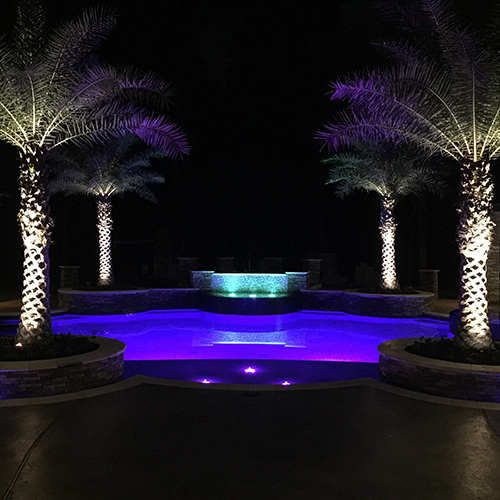 lighting-led-pool-lights-the-woodlands-tx-houston-pool-builder-construction-best-stone-travertine-pebble-tec-night-luxury-award-winning-spring-cypress-magnolia-envy-exteriors-outdoor-living.jpg