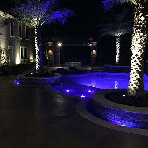 pool-lights-custom-pool-builder-construction-aggie-night-woodlands-spring-houston-tx-montgomery-colored-lighting-palm-planters-design-build-luxury-amazing-best.jpg