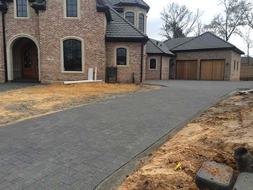 custom-paver-driveway-cobblestone-dark-gray-install--design-build-the-woodlands-carlton-woods-magnolia-cypress-contemporary-modern-best-envy-exteriors-pavers-best-installer-landscaper-new-home-construction-aggie-owned-family-company.jpg