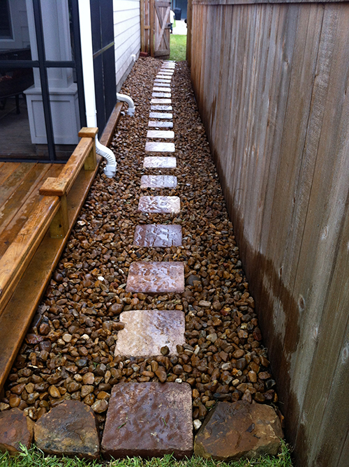 flagstone-stone-walkway-side-of-house-bullrock-wet-area-drainage-the-woodlands-build-install-spring-cypress-copnroe-best-envy.jpg